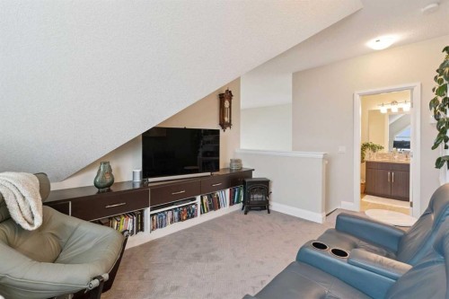 2410-15 Sunset Square, Cochrane, AB - Indoor Photo Showing Living Room