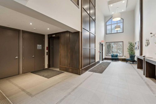 2410-15 Sunset Square, Cochrane, AB - Indoor Photo Showing Other Room