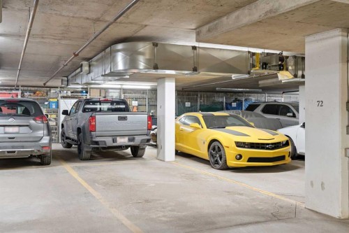 2410-15 Sunset Square, Cochrane, AB - Indoor Photo Showing Garage