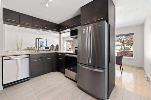 38 Westwood Drive Sw, Calgary, AB - Indoor Photo Showing Kitchen With Stainless Steel Kitchen With Upgraded Kitchen