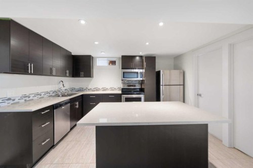 38 Westwood Drive Sw, Calgary, AB - Indoor Photo Showing Kitchen With Stainless Steel Kitchen With Upgraded Kitchen