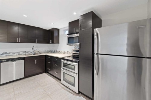 38 Westwood Drive Sw, Calgary, AB - Indoor Photo Showing Kitchen With Stainless Steel Kitchen With Double Sink With Upgraded Kitchen