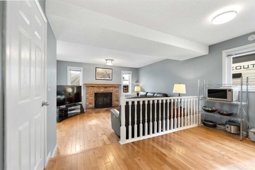 79 Macewan Meadow Rise Nw, Calgary, AB - Indoor With Fireplace