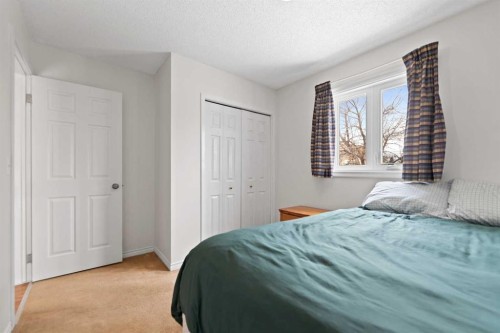 79 Macewan Meadow Rise Nw, Calgary, AB - Indoor Photo Showing Bedroom