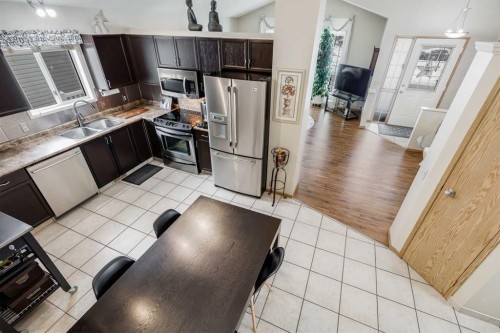 374 Martindale Boulevard Ne, Calgary, AB - Indoor Photo Showing Kitchen With Double Sink