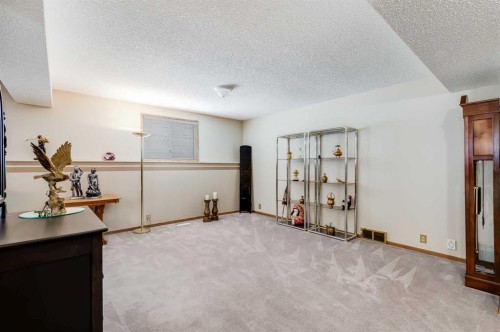 374 Martindale Boulevard Ne, Calgary, AB - Indoor Photo Showing Other Room