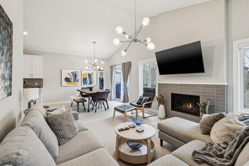103 Walgrove Green Se, Calgary, AB - Indoor Photo Showing Living Room With Fireplace