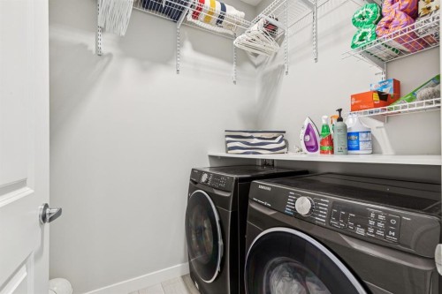 103 Walgrove Green Se, Calgary, AB - Indoor Photo Showing Laundry Room