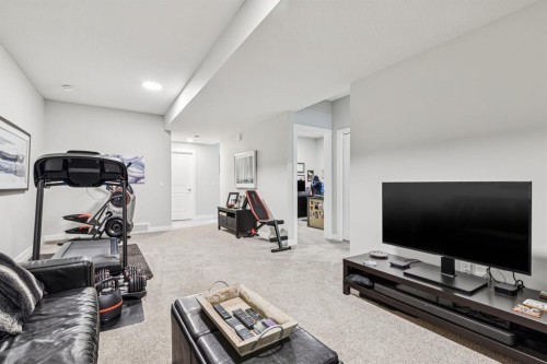 103 Walgrove Green Se, Calgary, AB - Indoor Photo Showing Gym Room