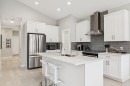 103 Walgrove Green Se, Calgary, AB  - Indoor Photo Showing Kitchen With Double Sink With Upgraded Kitchen 