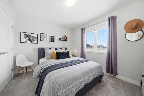 141 Willow Park, Cochrane, AB - Indoor Photo Showing Bedroom