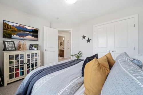 141 Willow Park, Cochrane, AB - Indoor Photo Showing Bedroom
