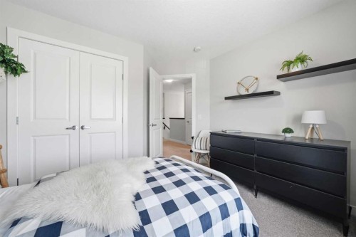 141 Willow Park, Cochrane, AB - Indoor Photo Showing Bedroom