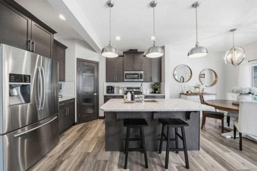 141 Willow Park, Cochrane, AB - Indoor Photo Showing Kitchen With Stainless Steel Kitchen With Upgraded Kitchen