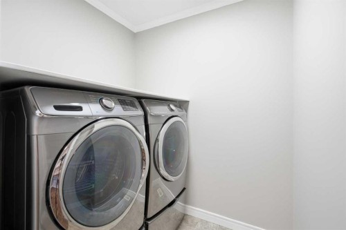 275 Chapalina Terrace Se, Calgary, AB - Indoor Photo Showing Laundry Room