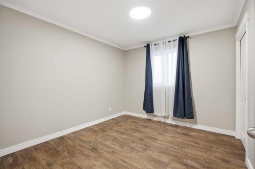 275 Chapalina Terrace Se, Calgary, AB - Indoor Photo Showing Other Room