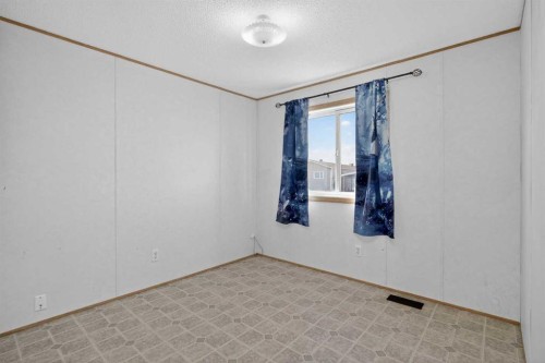 125 Erin Woods Circle Se, Calgary, AB - Indoor Photo Showing Other Room