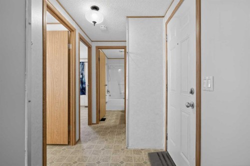 125 Erin Woods Circle Se, Calgary, AB - Indoor Photo Showing Other Room