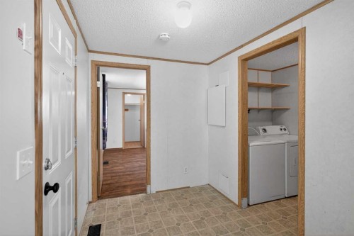 125 Erin Woods Circle Se, Calgary, AB - Indoor Photo Showing Laundry Room