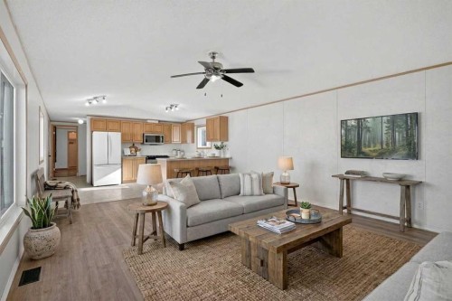 125 Erin Woods Circle Se, Calgary, AB - Indoor Photo Showing Living Room