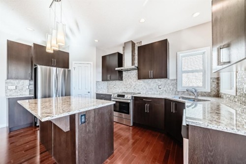 20 Walden Green Se, Calgary, AB - Indoor Photo Showing Kitchen With Stainless Steel Kitchen With Double Sink With Upgraded Kitchen