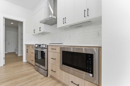 358 Corner Glen Way Ne, Calgary, AB - Indoor Photo Showing Kitchen With Upgraded Kitchen