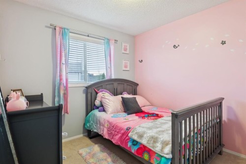67 Copperfield Rise Se, Calgary, AB - Indoor Photo Showing Bedroom
