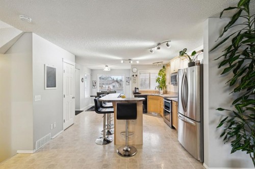 67 Copperfield Rise Se, Calgary, AB - Indoor Photo Showing Kitchen With Stainless Steel Kitchen