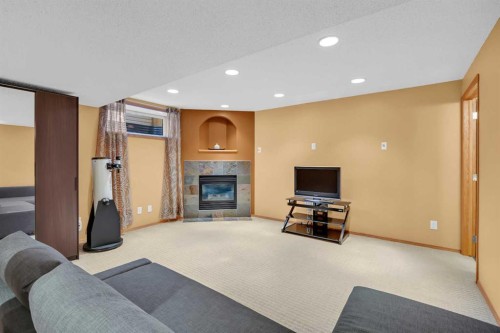192 Somerglen Common, Calgary, AB - Indoor With Fireplace