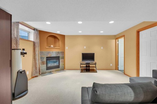 192 Somerglen Common, Calgary, AB - Indoor With Fireplace
