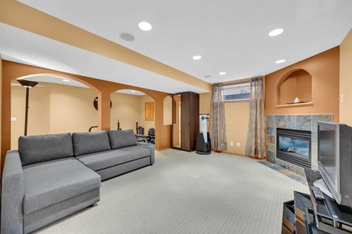 192 Somerglen Common, Calgary, AB - Indoor With Fireplace