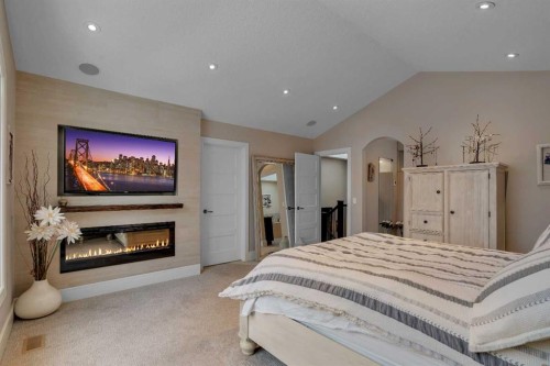 2041 45 Avenue Sw, Calgary, AB - Indoor Photo Showing Bedroom With Fireplace