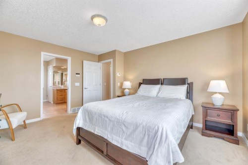 56 Evergreen Crescent Sw, Calgary, AB - Indoor Photo Showing Bedroom