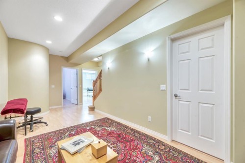 56 Evergreen Crescent Sw, Calgary, AB - Indoor Photo Showing Other Room