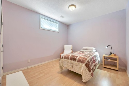 56 Evergreen Crescent Sw, Calgary, AB - Indoor Photo Showing Bedroom