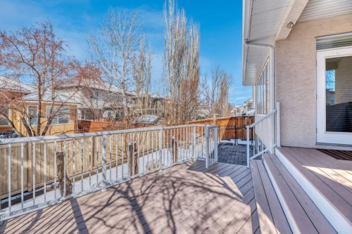 56 Evergreen Crescent Sw, Calgary, AB - Outdoor With Deck Patio Veranda With Exterior
