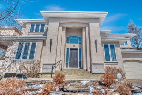 56 Evergreen Crescent Sw, Calgary, AB - Outdoor With Facade