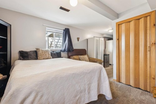 7417 24 Street Se, Calgary, AB - Indoor Photo Showing Bedroom