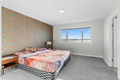 437 Corner Meadows Way Ne, Calgary, AB - Indoor Photo Showing Bedroom