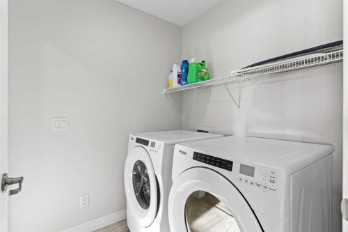 437 Corner Meadows Way Ne, Calgary, AB - Indoor Photo Showing Laundry Room