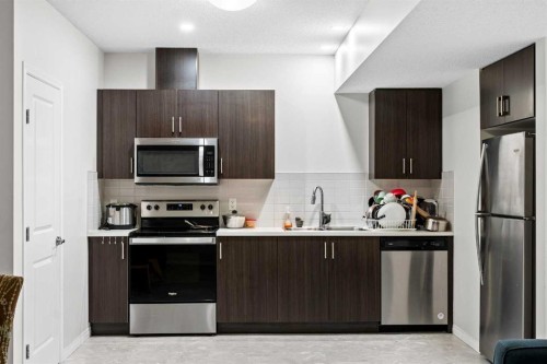 437 Corner Meadows Way Ne, Calgary, AB - Indoor Photo Showing Kitchen With Stainless Steel Kitchen With Double Sink With Upgraded Kitchen