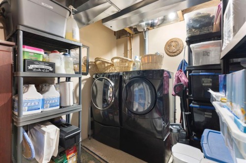 352 Elgin Gardens Se, Calgary, AB - Indoor Photo Showing Laundry Room