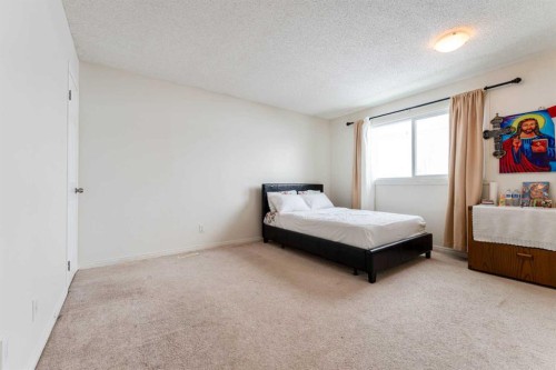 147 Templewood Drive Ne, Calgary, AB - Indoor Photo Showing Bedroom