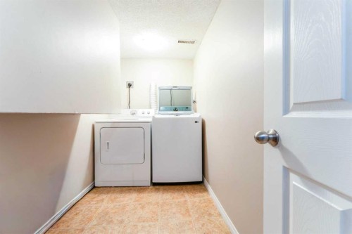 147 Templewood Drive Ne, Calgary, AB - Indoor Photo Showing Laundry Room