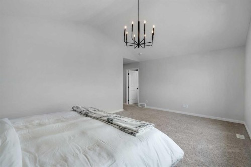 23 Savoy Terrace Se, Calgary, AB - Indoor Photo Showing Bedroom