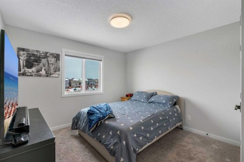 23 Savoy Terrace Se, Calgary, AB - Indoor Photo Showing Bedroom