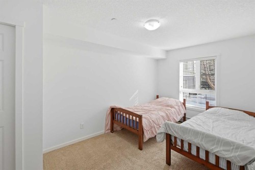 2102-279 Copperpond Common Se, Calgary, AB - Indoor Photo Showing Bedroom