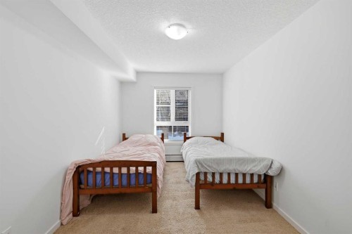 2102-279 Copperpond Common Se, Calgary, AB - Indoor Photo Showing Bedroom