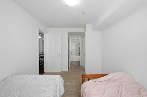 2102-279 Copperpond Common Se, Calgary, AB - Indoor Photo Showing Bedroom