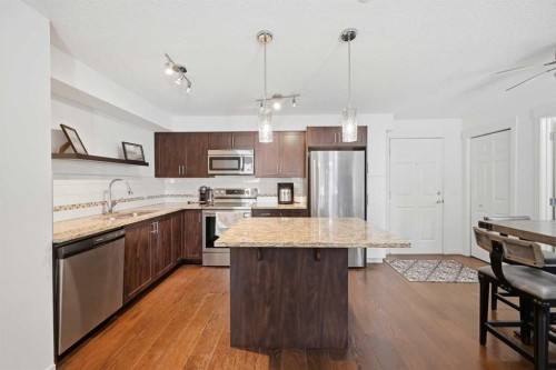 2102-279 Copperpond Common Se, Calgary, AB - Indoor Photo Showing Kitchen With Stainless Steel Kitchen With Upgraded Kitchen